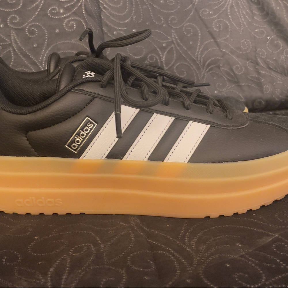 Adidas Black and White Athletic Shoes with Three-Stripe Design